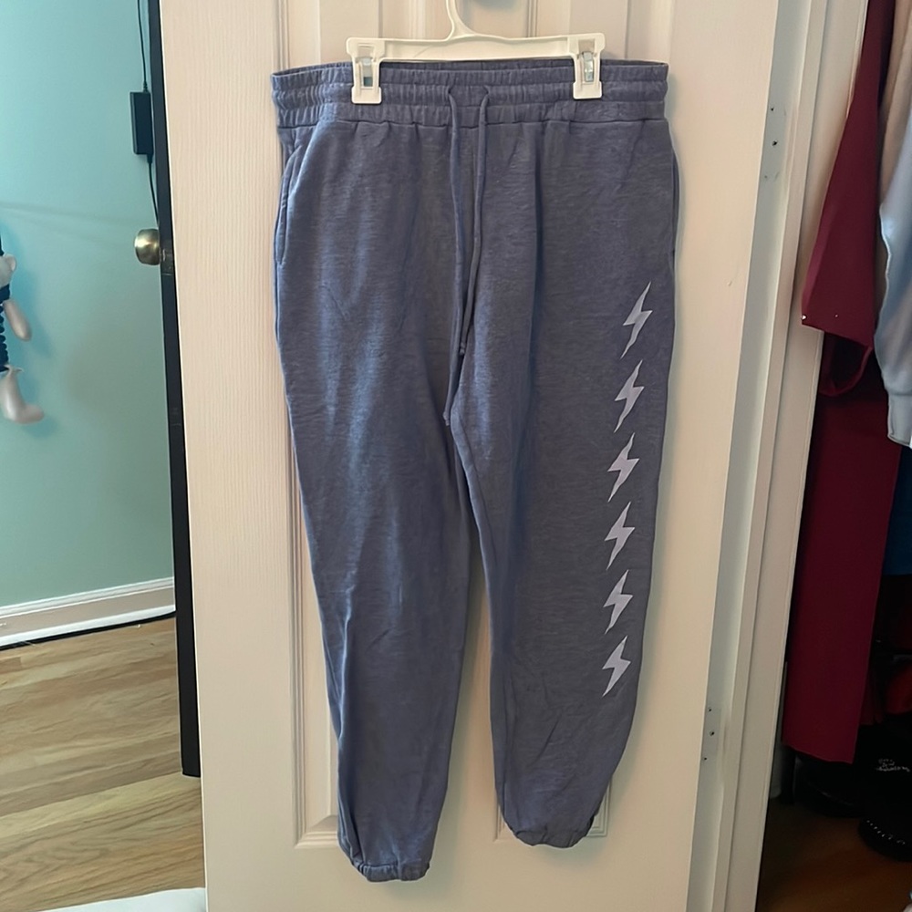 blue sweatpants with lightning bolts